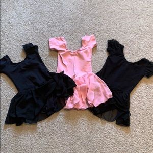 Three dance leotards